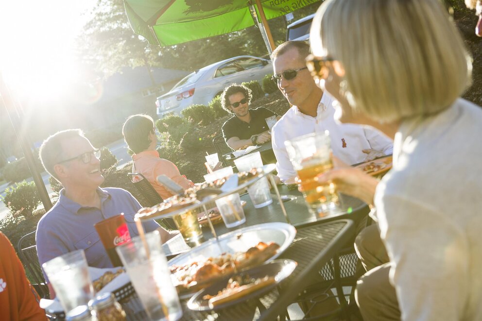 Family dining at restaurant in Patrick Square TownCenter